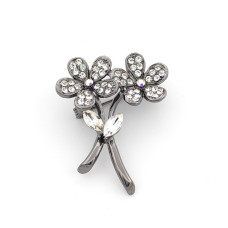 Брошка с камъни във форма на цветя и тъмно сребрист обков