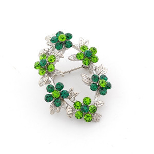 Брошка цветя с камъни в зелено – елегантен дамски аксесоар