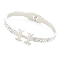 Дамска гривна от медицинска стомана със сребрист блясък и кристали Дамска гривна от медицинска стомана със сребрист блясък и кристали