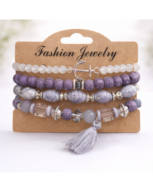 Дамска гривна с мъниста в лилаво с висулка пискюл Дамска гривна с мъниста в лилаво с висулка пискюл