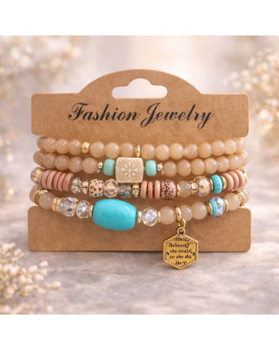 Стилна дамска гривна с бежови мъниста и декоративна висулка Стилна дамска гривна с бежови мъниста и декоративна висулка