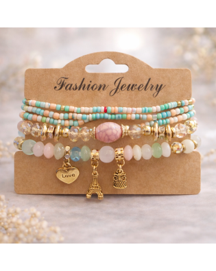 Стилна дамска гривна с пастелни мъниста и висящи висулки Стилна дамска гривна с пастелни мъниста и висящи висулки