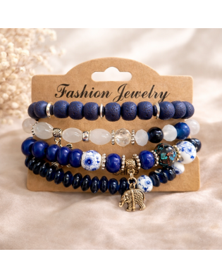 Дамска гривна със сини мъниста и висулка слонче